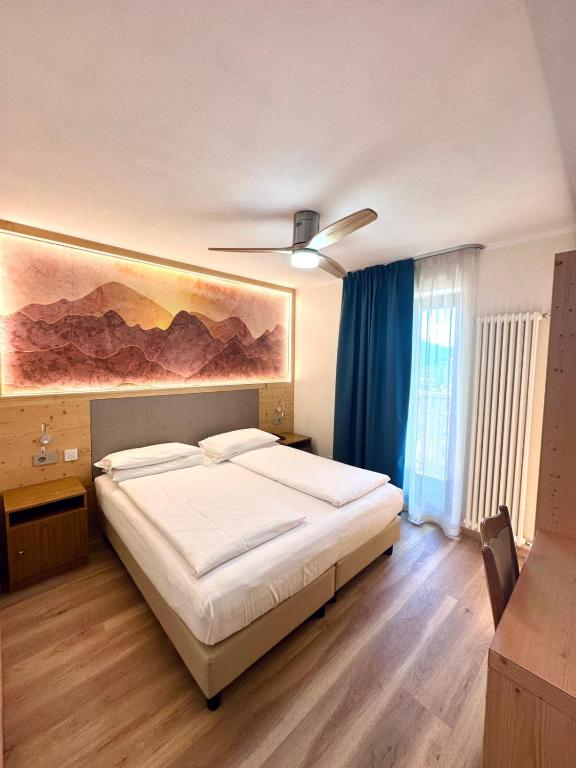 Postel nebo postele na pokoji v ubytování Hotel Denny