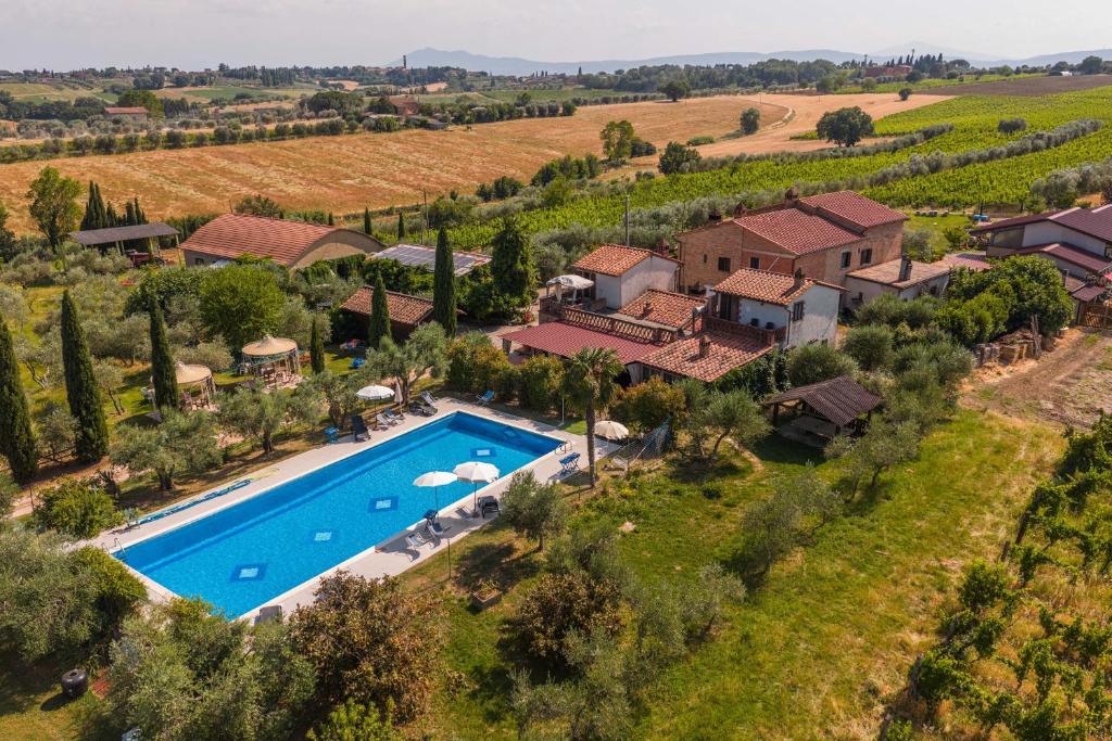 an aerial view of a villa with a swimming pool at Il Castagneto Country Retreat in Pozzuolo