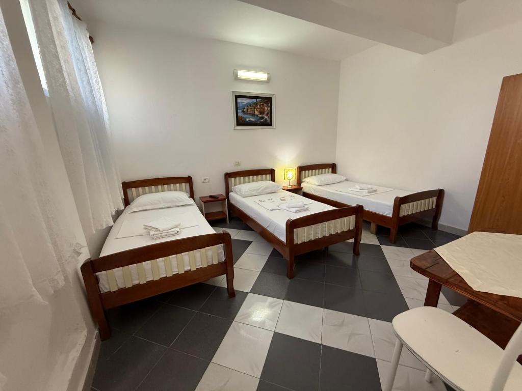 Postel nebo postele na pokoji v ubytování GuestHouse NOVI