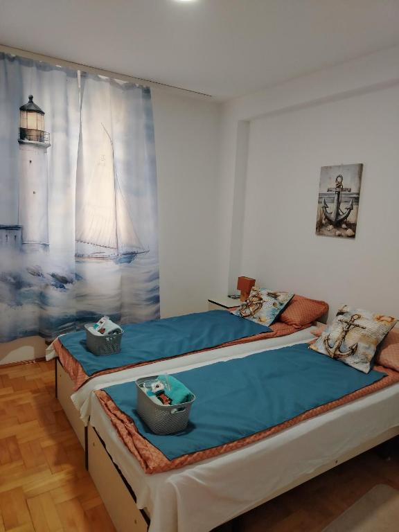 Postel nebo postele na pokoji v ubytování Apartman Domina