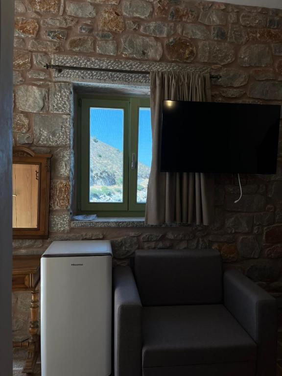 Kuchyň nebo kuchyňský kout v ubytování Arapis Rooms & Suites