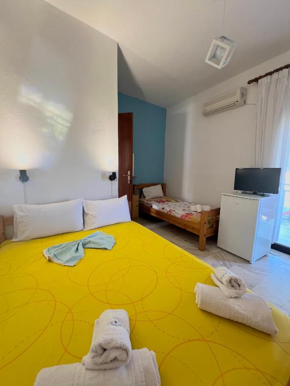 Łóżko lub łóżka w pokoju w obiekcie Summer Rooms