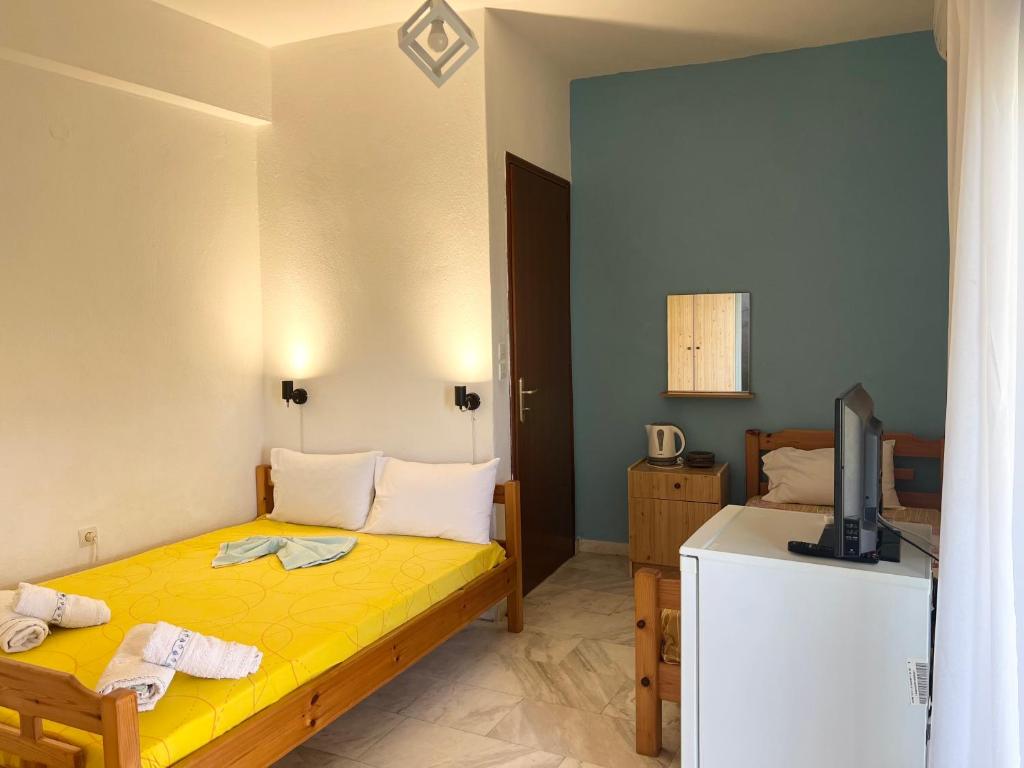 Łóżko lub łóżka w pokoju w obiekcie Summer Rooms