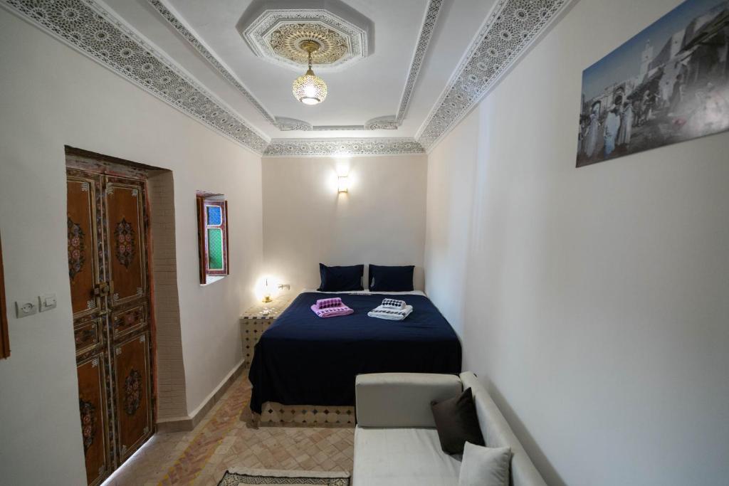 Postel nebo postele na pokoji v ubytování Riad Fez Unique