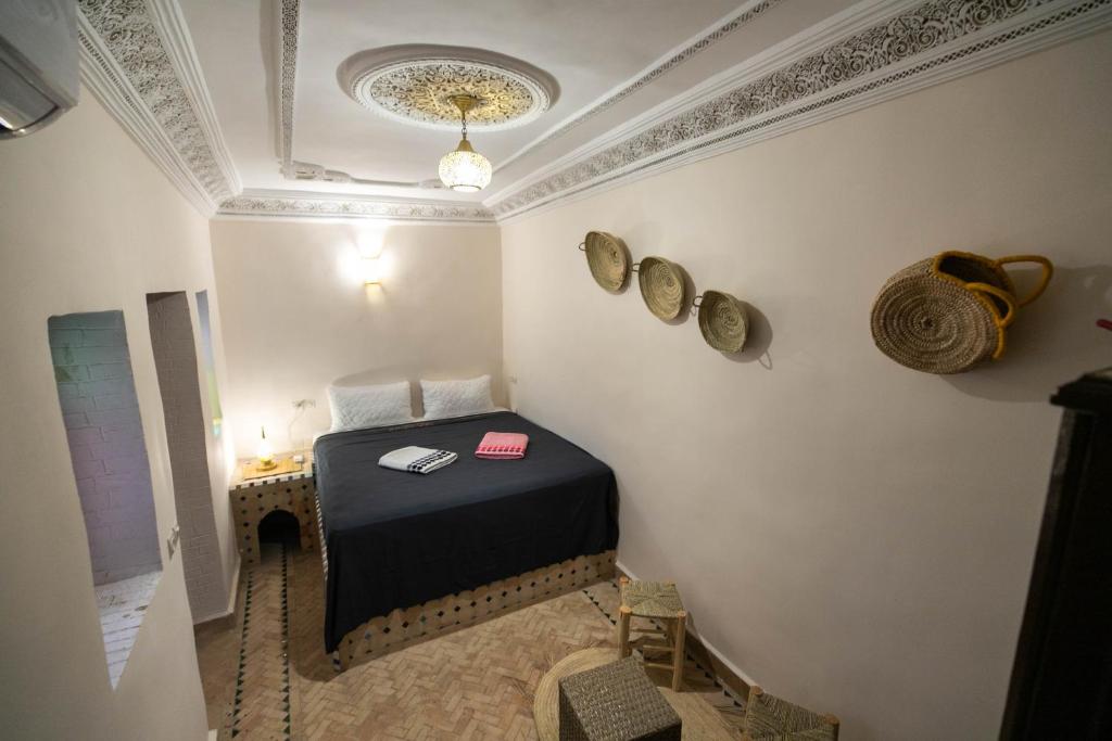 Postel nebo postele na pokoji v ubytování Riad Fez Unique