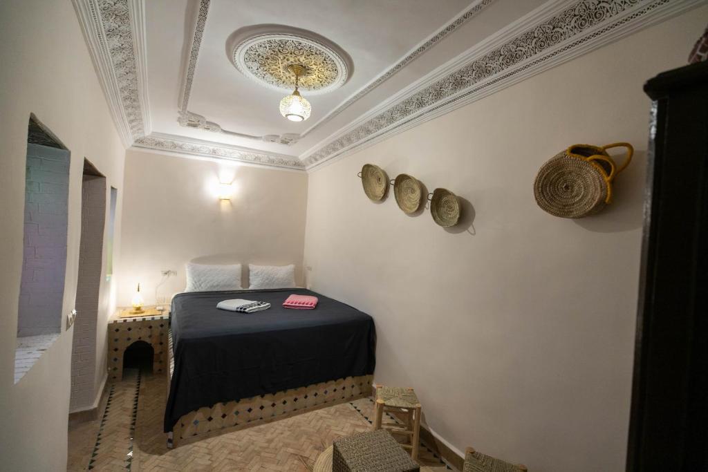 Postel nebo postele na pokoji v ubytování Riad Fez Unique