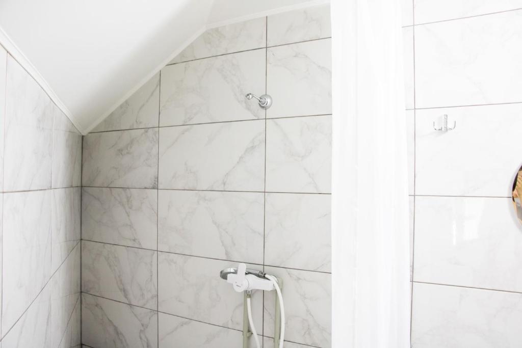Koupelna v ubytování Hotel BILYI AIST