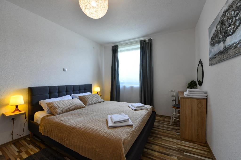 Postel nebo postele na pokoji v ubytování Holiday Home Ostrun