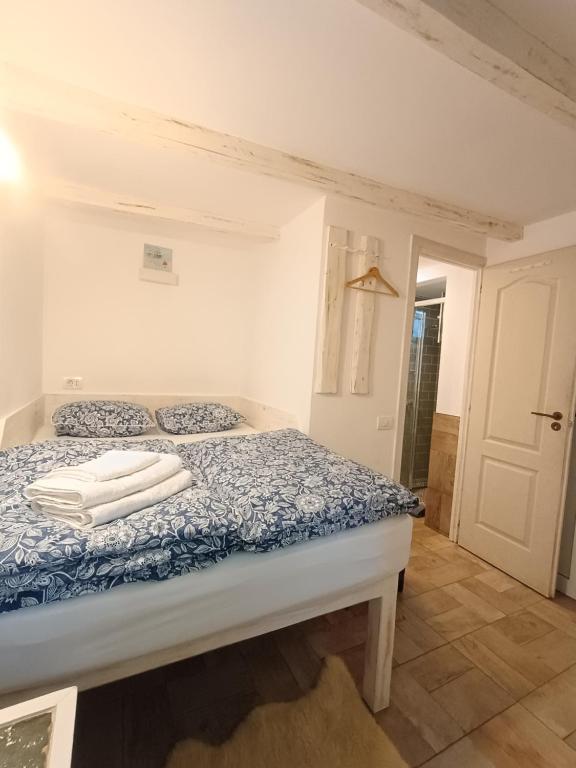 Giường trong phòng chung tại The Bungalow