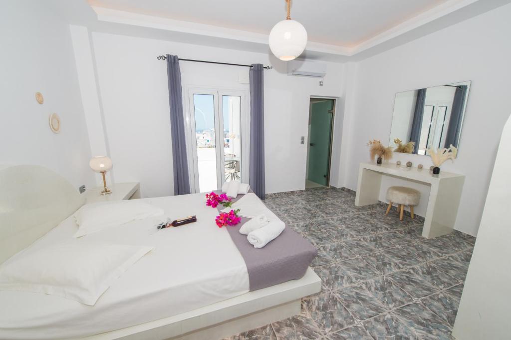 Postel nebo postele na pokoji v ubytování The F Suites