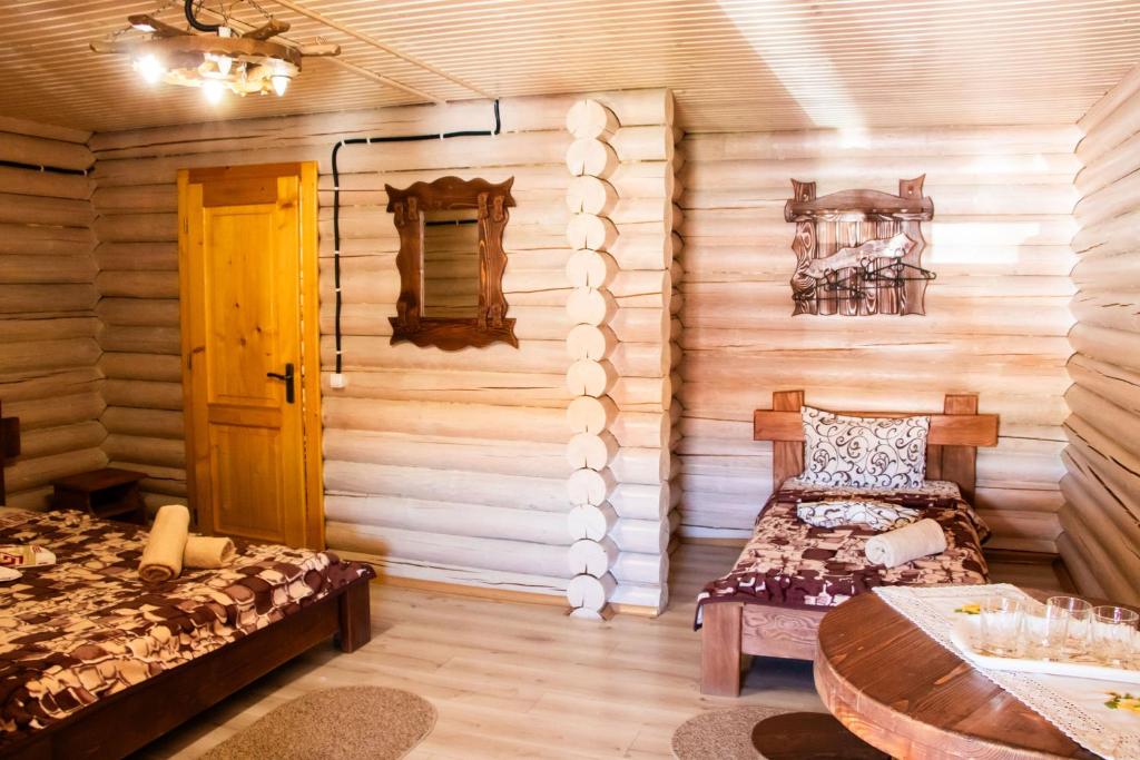 Postel nebo postele na pokoji v ubytování Hotel BILYI AIST