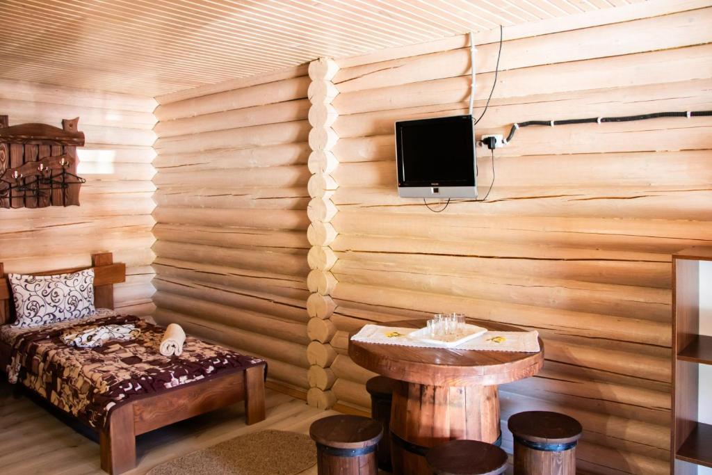 TV a/nebo společenská místnost v ubytování Hotel BILYI AIST