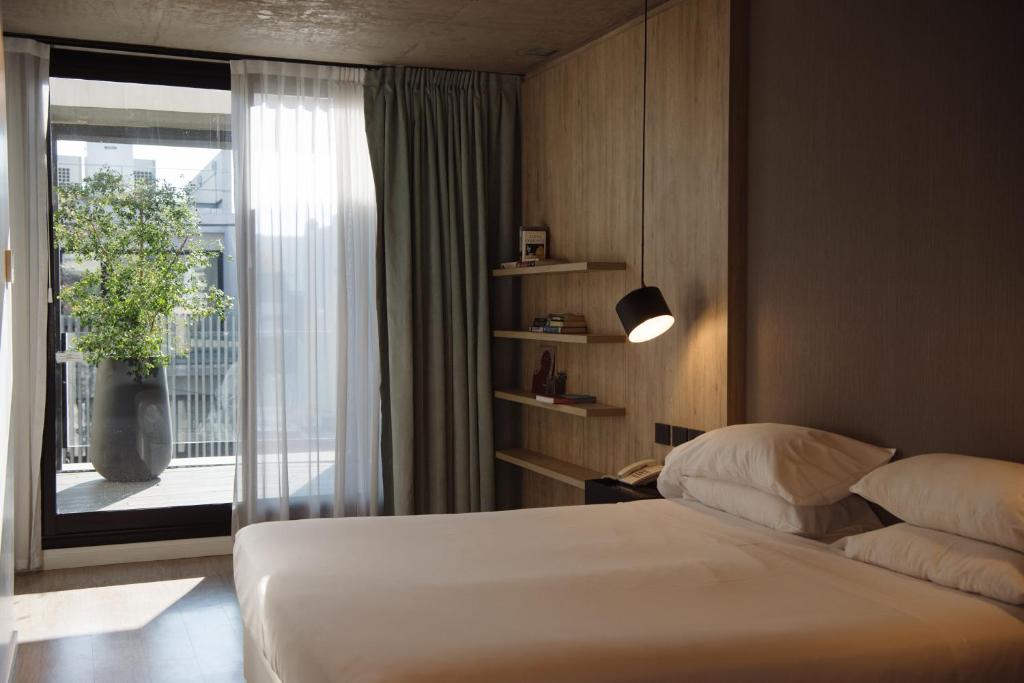 Кровать или кровати в номере Krista Boutique Hotel