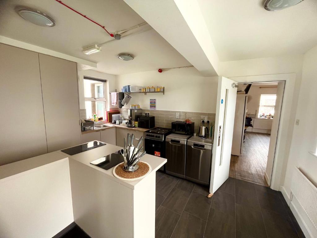 a kitchen with a sink and a counter top at The Nest at Strandhill in Strandhill