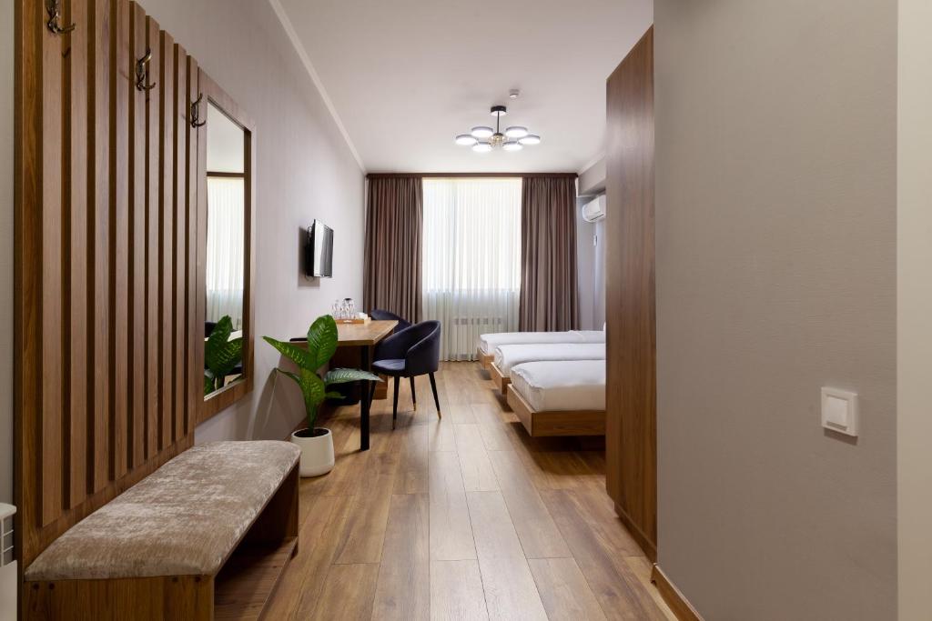 Postel nebo postele na pokoji v ubytování Gelati Residence