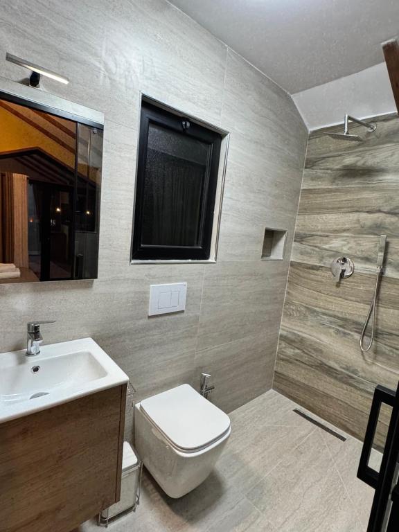 Koupelna v ubytování Alpinehouse