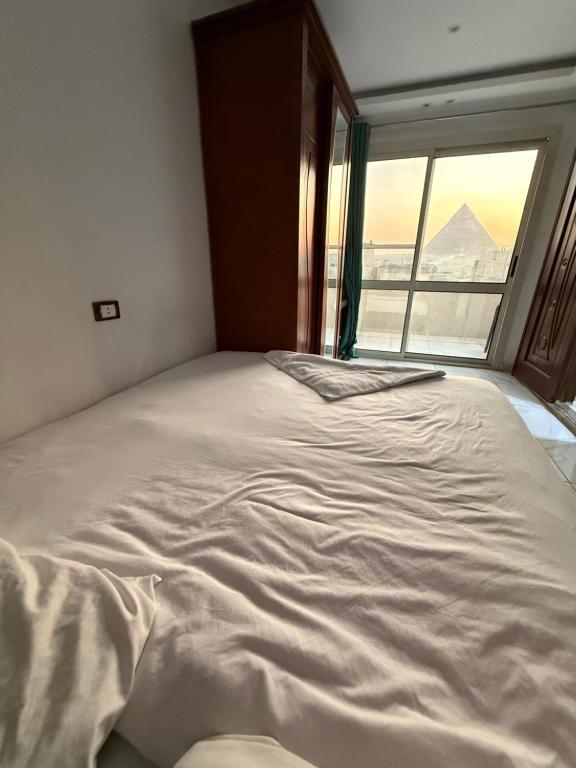 Postel nebo postele na pokoji v ubytování Sphinx Middle East