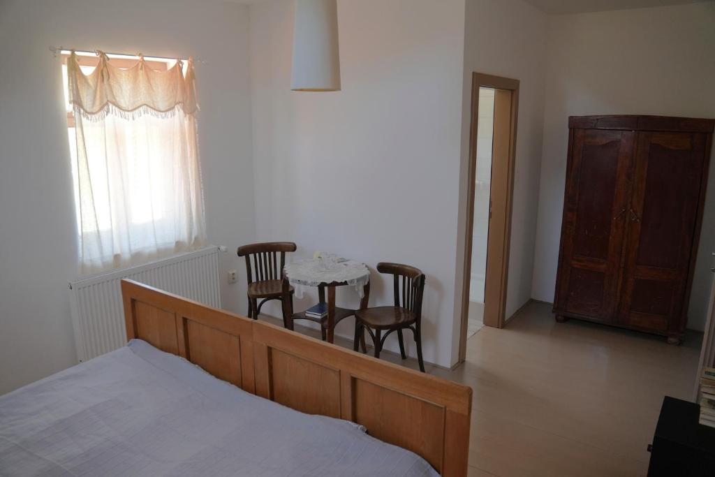 Postel nebo postele na pokoji v ubytování Bed&More Almáspuszta