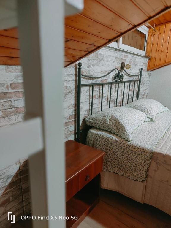 Postel nebo postele na pokoji v ubytování BB Cesarò Mariolo house
