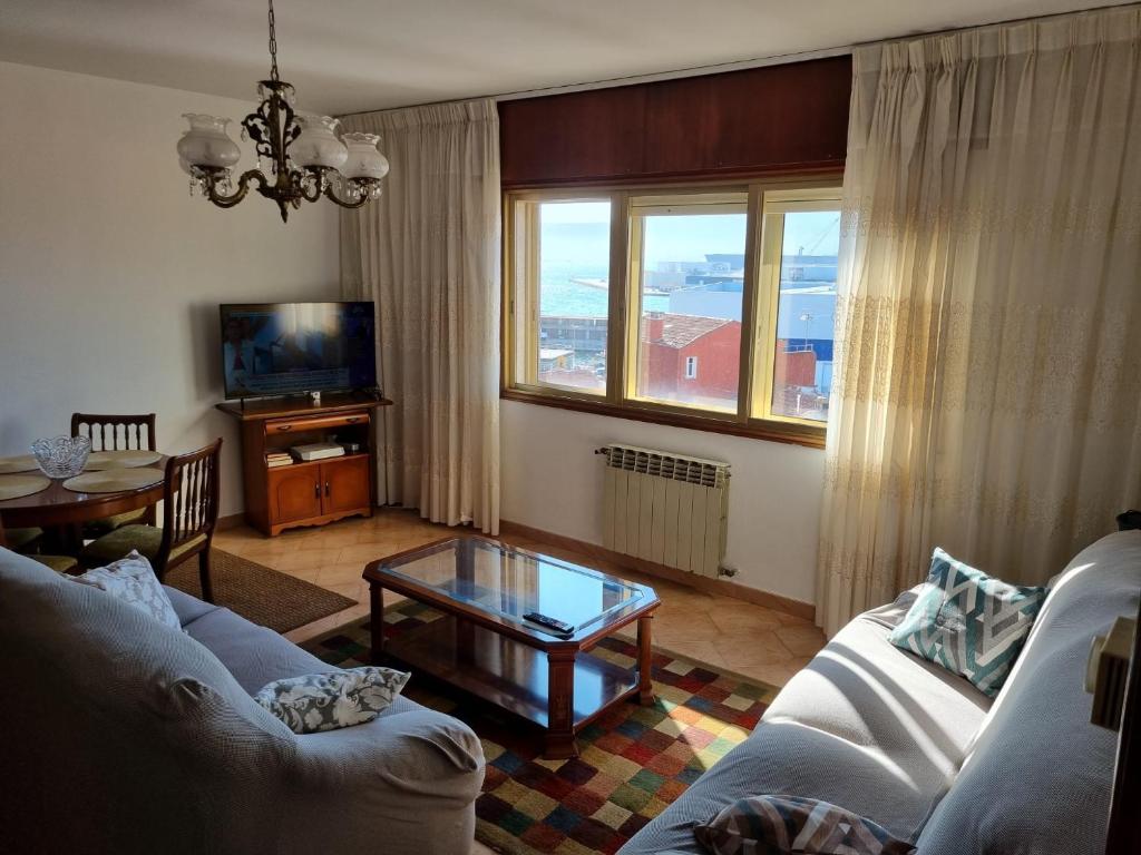 a living room with a couch and a table at Concepción Arenal 175 in Marín