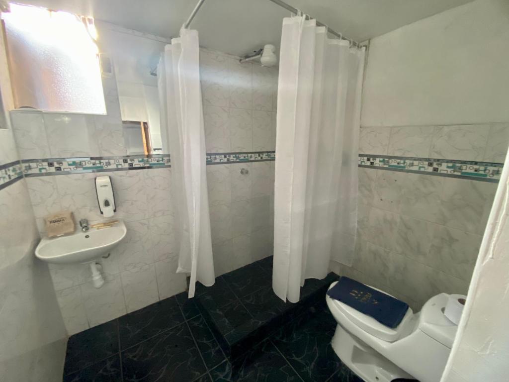 Koupelna v ubytování Hotel Panaka II