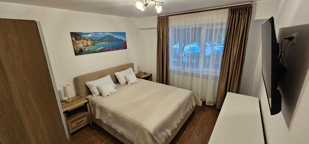 Postel nebo postele na pokoji v ubytování Apartament Nou, Complet Utilat, Ideal pentru Familii, Aproape de Mall, Parc și Plajă