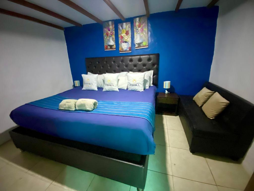 Postel nebo postele na pokoji v ubytování Hotel Panaka II