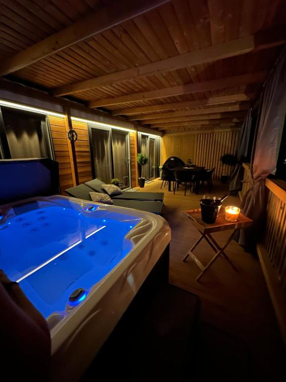 a large jacuzzi tub in a room at Mobile home LUNA Selce in Selce