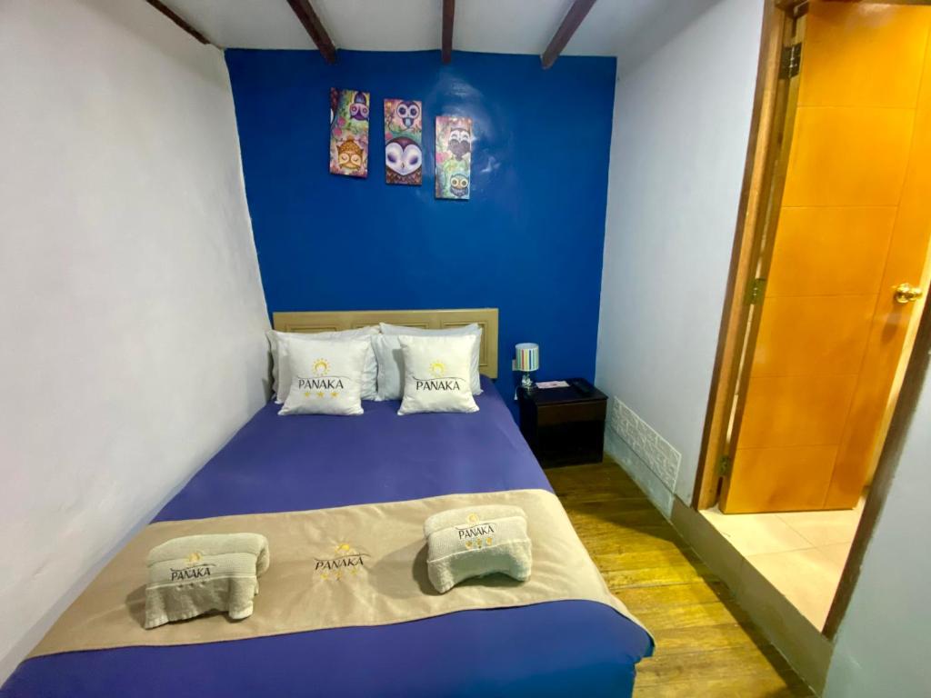 Postel nebo postele na pokoji v ubytování Hotel Panaka II