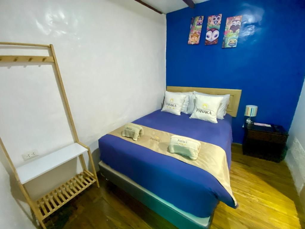 Postel nebo postele na pokoji v ubytování Hotel Panaka II