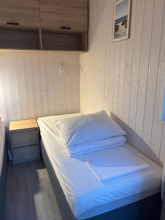Postel nebo postele na pokoji v ubytování Leśna Przystań