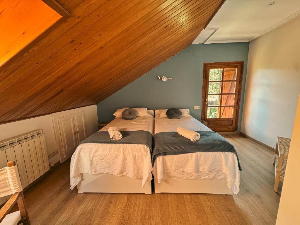 Postel nebo postele na pokoji v ubytování Hotel de Montaña Uson