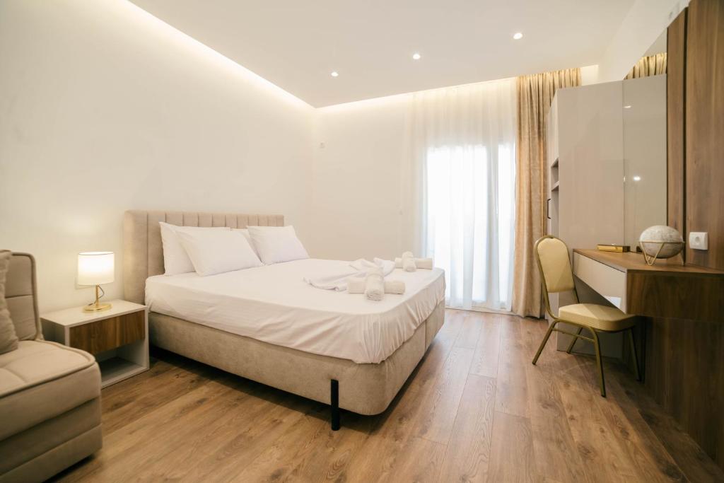 Uma cama ou camas num quarto em Hotel Ajana