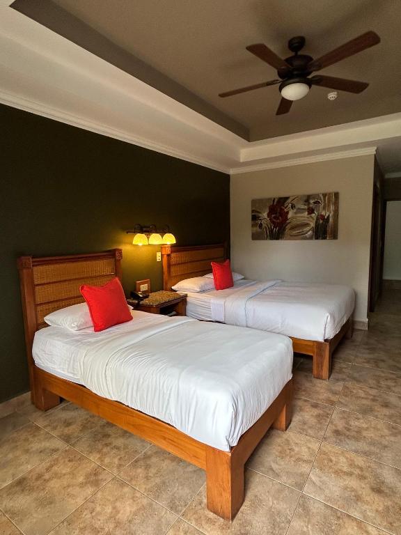 Postel nebo postele na pokoji v ubytování Hotel Ladera