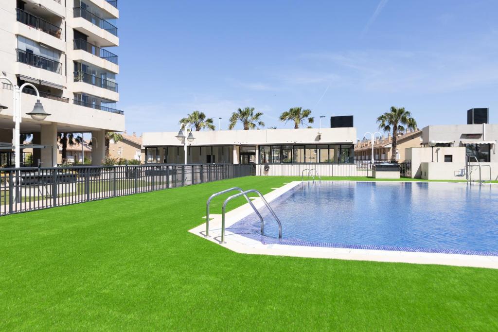 Apartamento con Vistas al mar, Piscina y Pista de Paddle