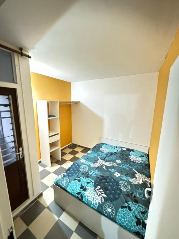 Postel nebo postele na pokoji v ubytování Appartement en colocation