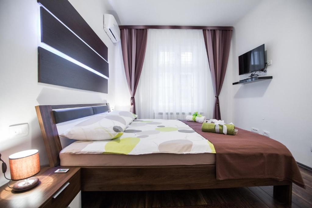 Posteľ alebo postele v izbe v ubytovaní VisitZagreb Emerald