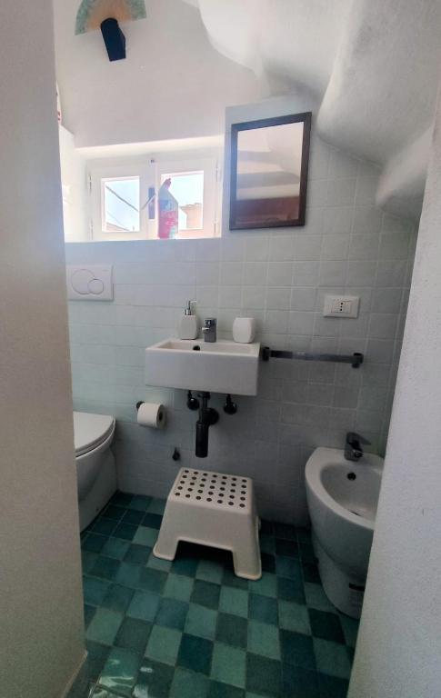 A bathroom at Casa del porticciolo