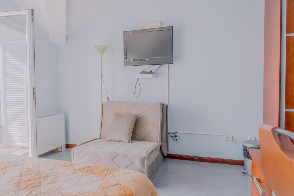 Postel nebo postele na pokoji v ubytování Hotel R