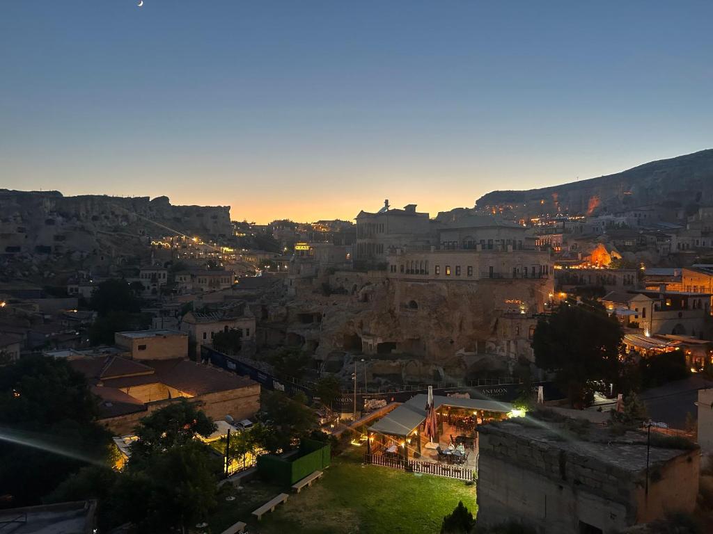 a view of a city at night at Bella vista stone house in Urgup