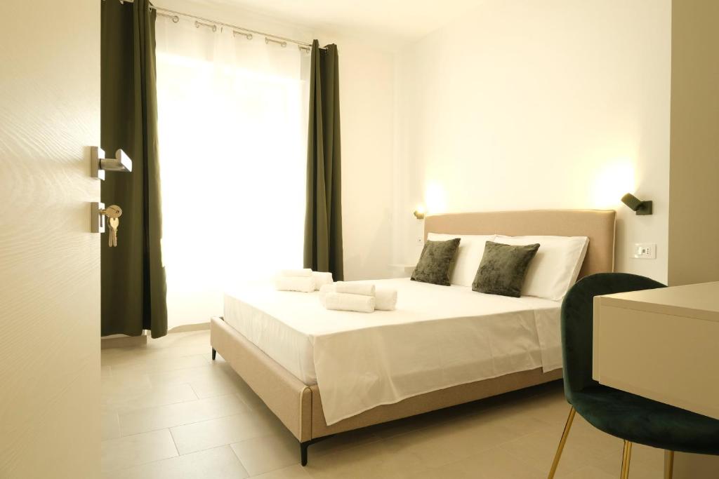 Postel nebo postele na pokoji v ubytování Marephis Rooms - Alghero