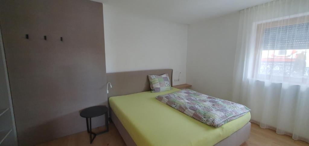 Postel nebo postele na pokoji v ubytování B&B Haus Grüner