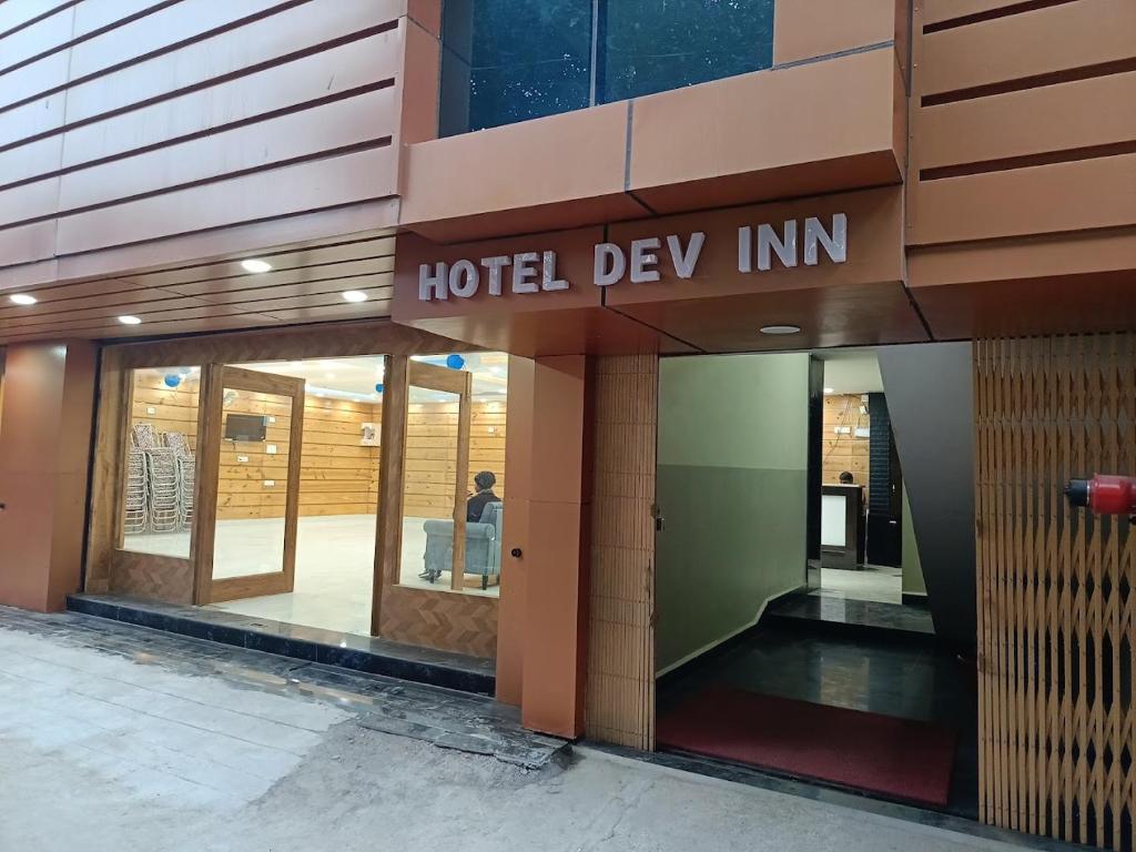 a hotel deew inn sign on the side of a building at HOTEL DEV INN, Begusarai in Jāmb