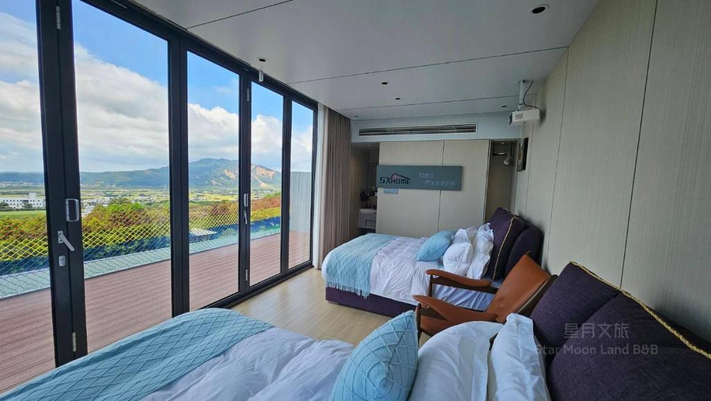 Ένα ή περισσότερα κρεβάτια σε δωμάτιο στο 星月文旅民宿