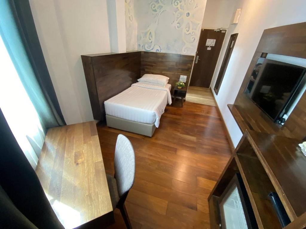 TV a/nebo společenská místnost v ubytování Serapi Hotel