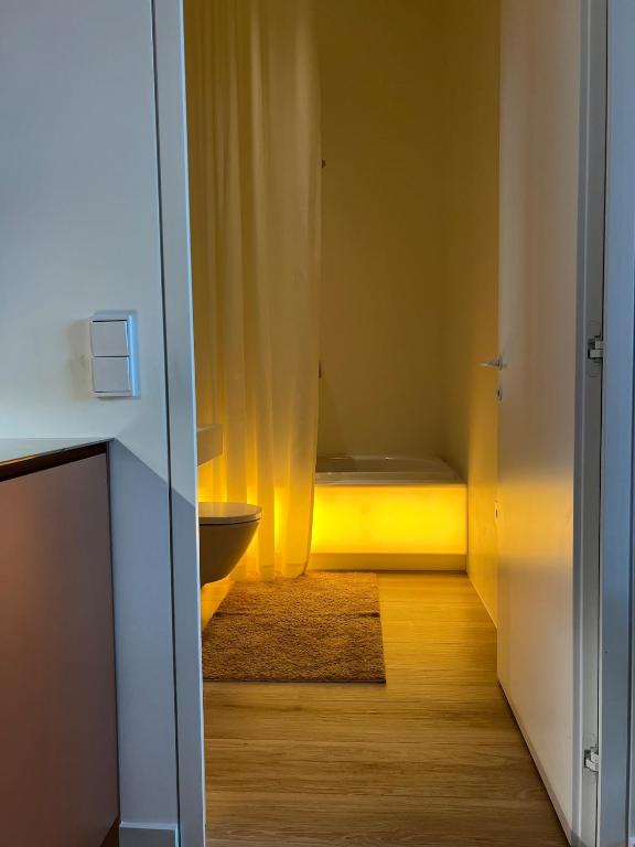 Letto o letti in una camera di Design apartment with view to Nemunas, Prienai