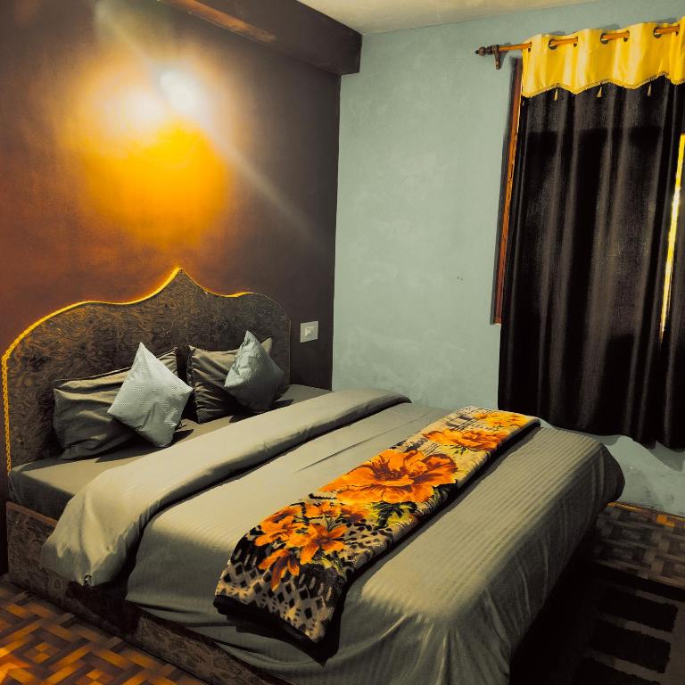 Postel nebo postele na pokoji v ubytování Non Stop Cafe Hostel & Stay
