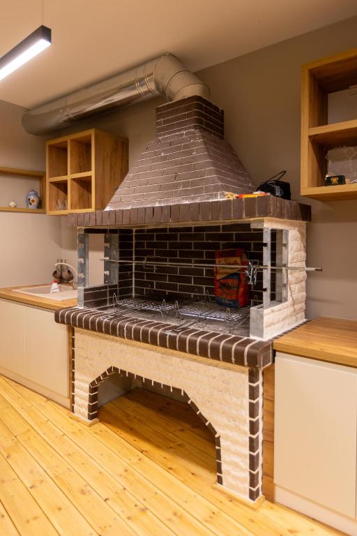 Kuchyň nebo kuchyňský kout v ubytování ZANI'S VILLA