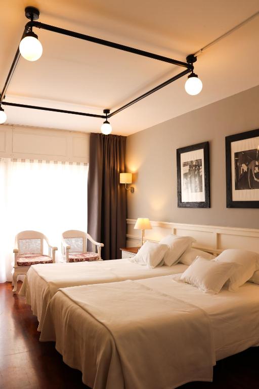 Postel nebo postele na pokoji v ubytování Hotel Vostra Llar