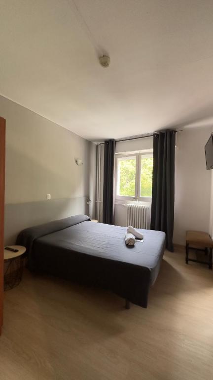 Postel nebo postele na pokoji v ubytování Siracusa